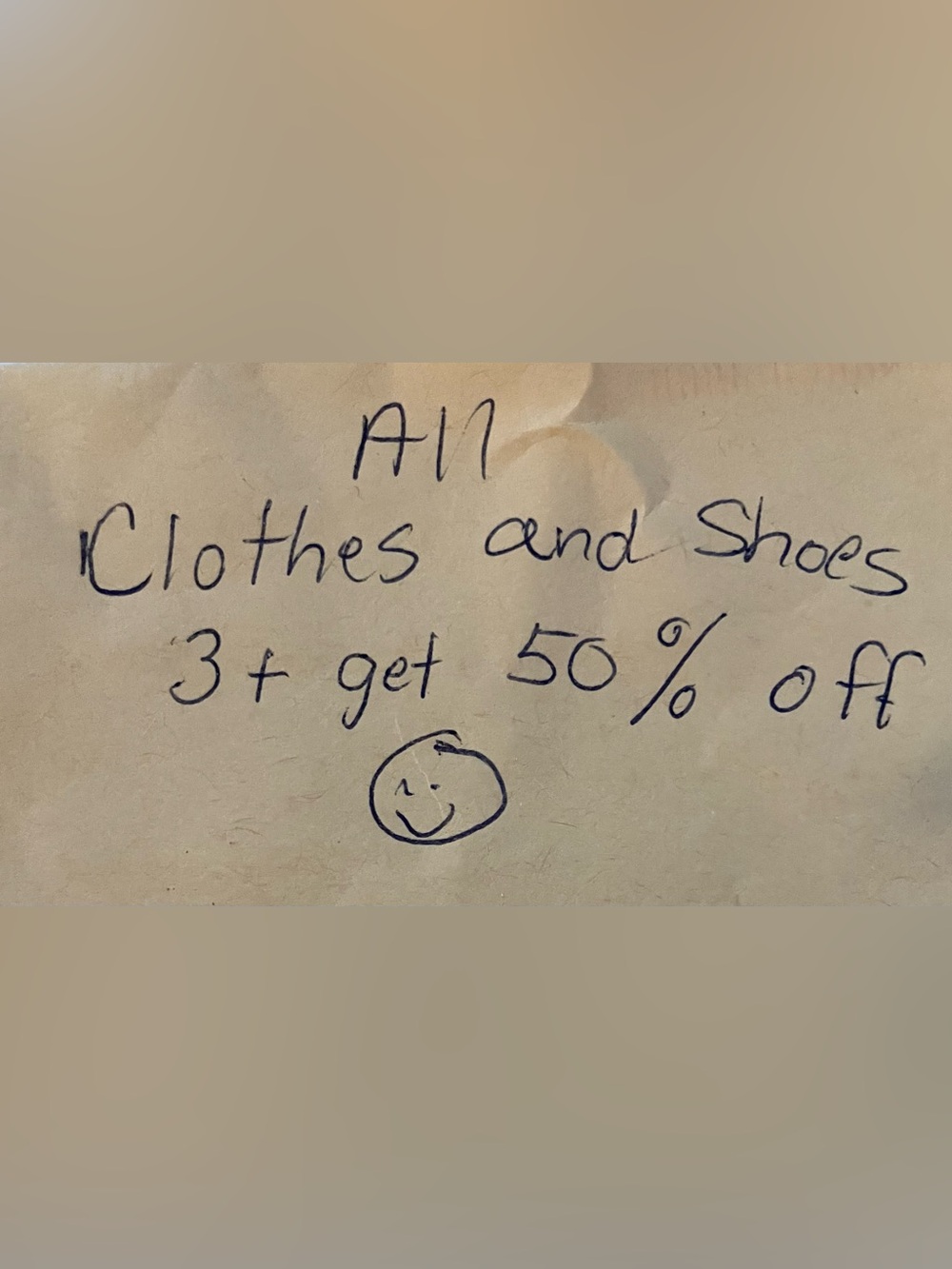Handwritten Note on Cream Paper - Black Ink
